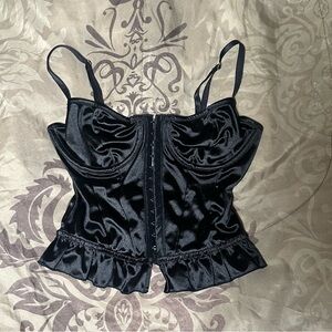 Black satin corset top with ruffles